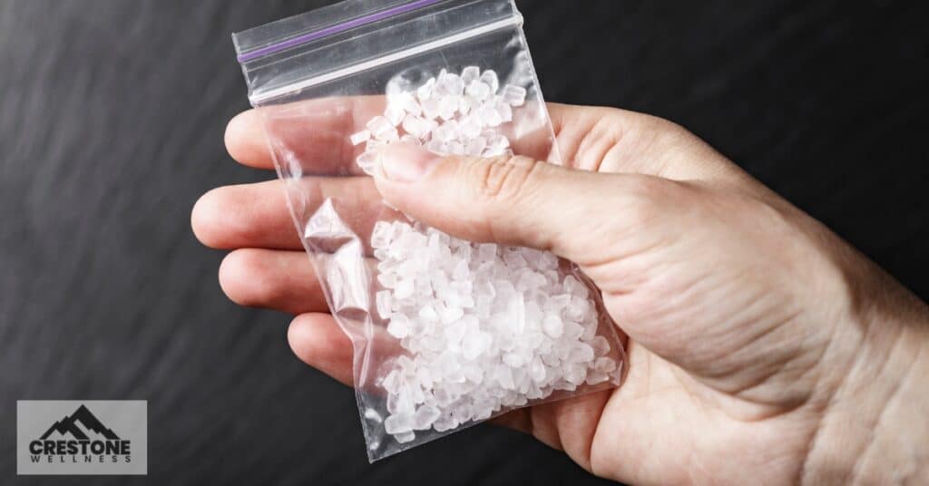 Person holding a tina drug - tina drug name crystal meth
