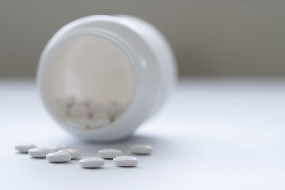 White pill bottle of prescription drugs- benzo addiction treatment program texas